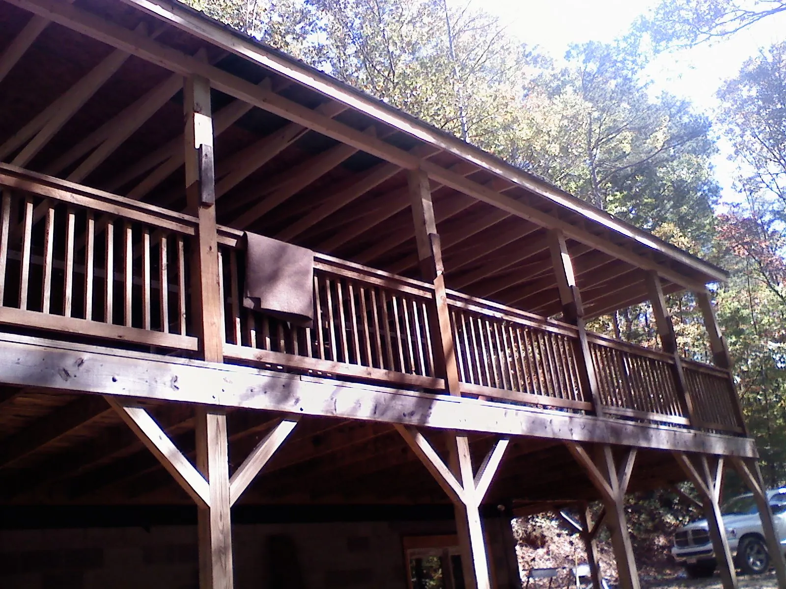 Timber framing under a new elevated porch and deck — Roof Leak Repair in Scarsdale by Roofing Brothers